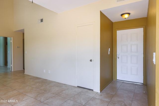 foyer entrance featuring light tile patterned floors