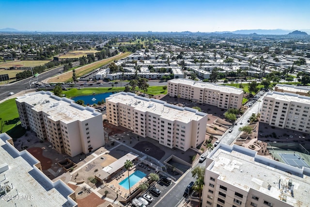 birds eye view of property featuring a mountain view