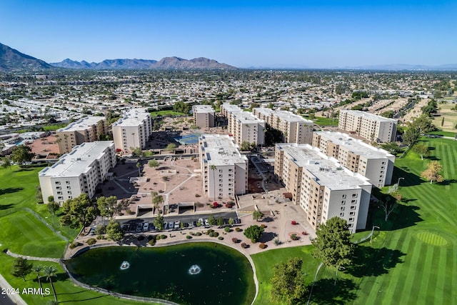 aerial view featuring a water and mountain view