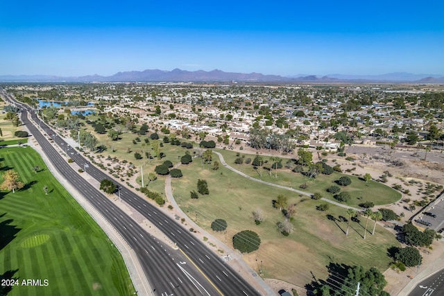 birds eye view of property featuring a mountain view