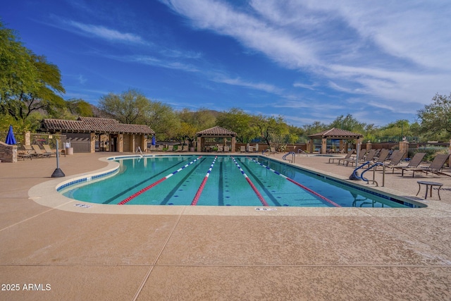 view of pool with a gazebo and a patio