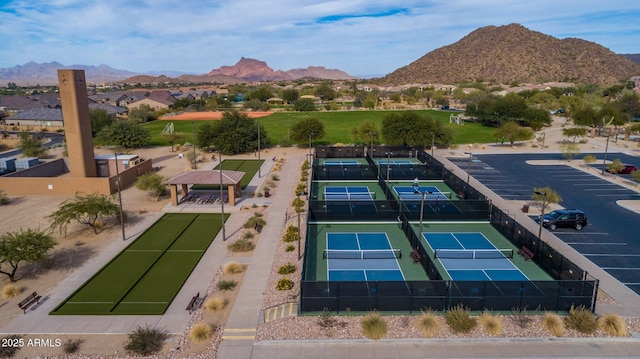 birds eye view of property featuring a mountain view