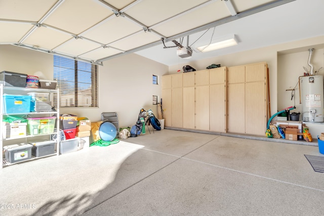 garage with a garage door opener and water heater