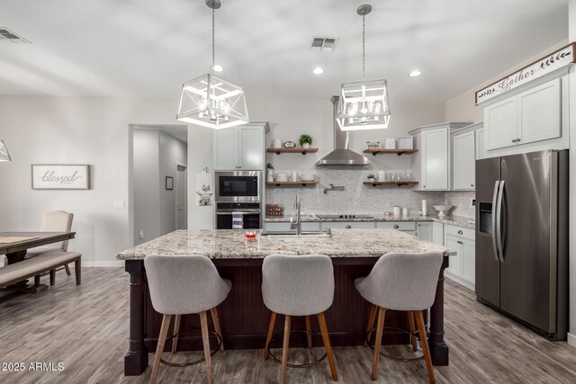 19436 W Windsor Ave, Buckeye, AZ 85396 - kitchen with appliances with stainless steel finishes, a chandelier, open shelves, a sink, and recessed lighting
