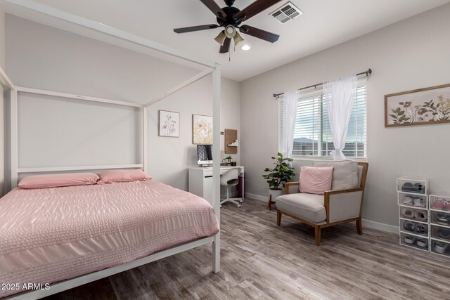 19436 W Windsor Ave, Buckeye, AZ 85396 - bedroom featuring baseboards, wood finished floors, recessed lighting, and a ceiling fan