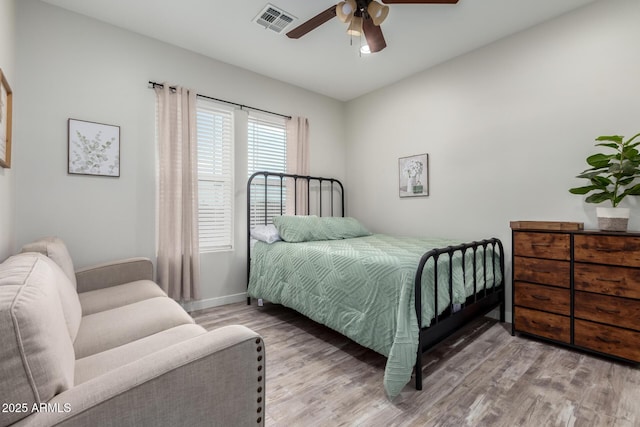 19436 W Windsor Ave, Buckeye, AZ 85396 - bedroom featuring wood finished floors, ceiling fan, and baseboards