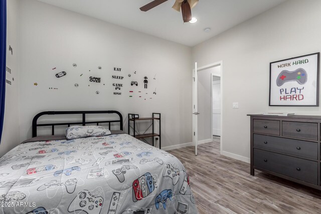 19436 W Windsor Ave, Buckeye, AZ 85396 - bedroom with wood finished floors, baseboards, and ceiling fan