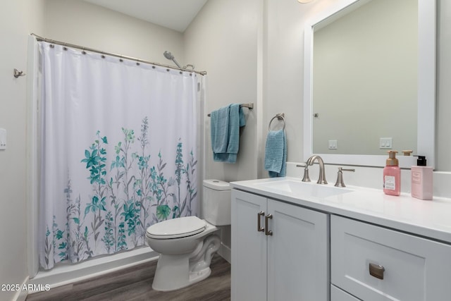19436 W Windsor Ave, Buckeye, AZ 85396 - full bathroom featuring toilet, wood finished floors, vanity, and a shower with curtain