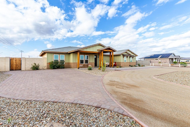 19436 W Windsor Ave, Buckeye, AZ 85396 - single story home with curved driveway, fence, and a gate