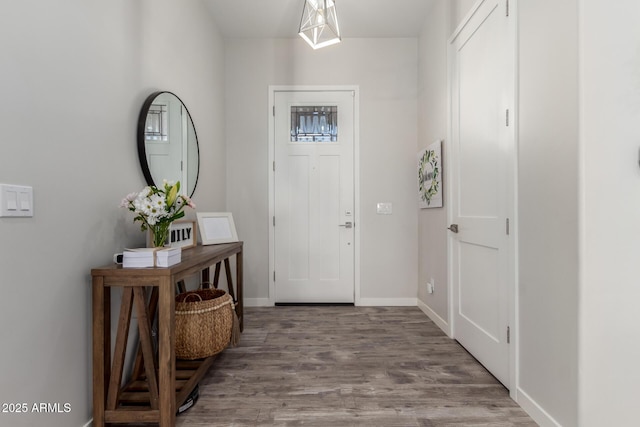 19436 W Windsor Ave, Buckeye, AZ 85396 - entryway with wood finished floors and baseboards