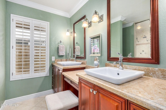 bathroom with tile patterned floors, vanity, and crown molding