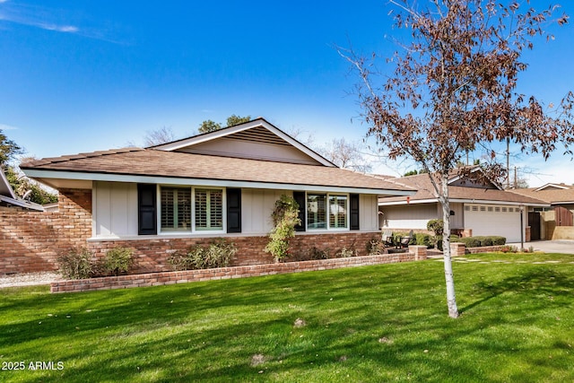 ranch-style house featuring a garage and a front lawn