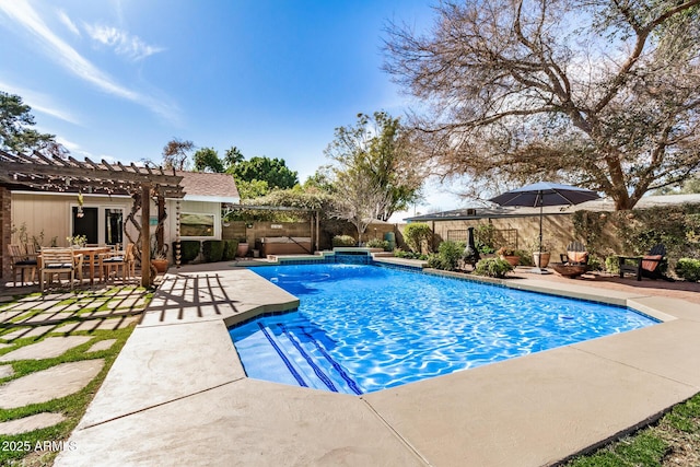 view of swimming pool featuring a pergola and a patio area