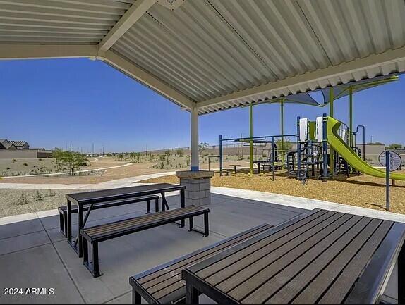 view of patio with a playground