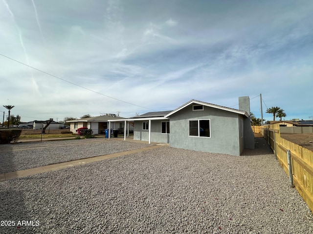 view of front of home featuring solar panels