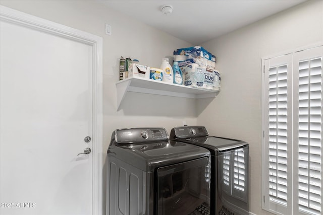 laundry room with laundry area and washing machine and dryer