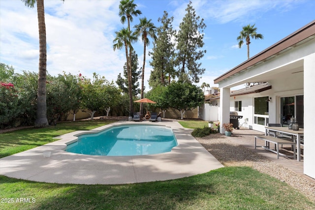 view of pool with a patio, a fenced backyard, a fenced in pool, and a grill