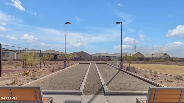 view of road featuring street lighting and a residential view