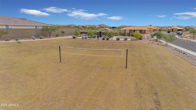 exterior space with a residential view and fence