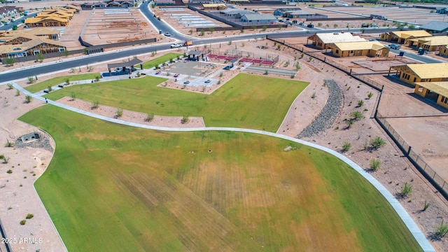 birds eye view of property with a residential view