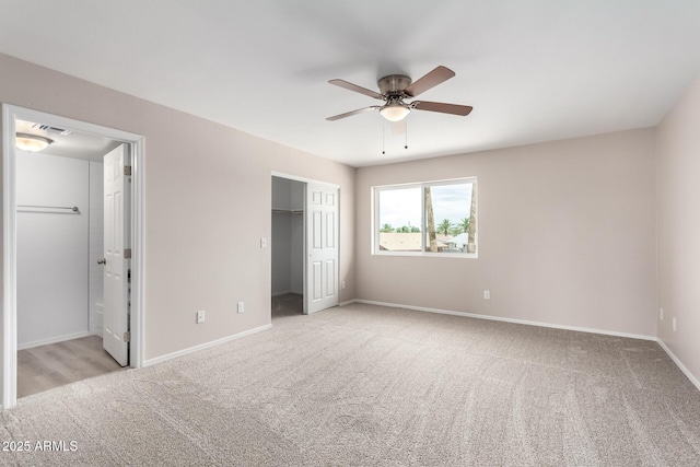 9803 N 40th Dr, Phoenix, AZ 85051 - unfurnished bedroom featuring carpet, baseboards, a closet, connected bathroom, and ceiling fan