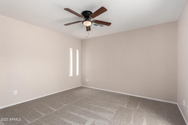 9803 N 40th Dr, Phoenix, AZ 85051 - carpeted spare room with a ceiling fan and baseboards
