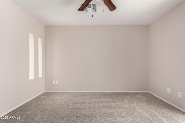 9803 N 40th Dr, Phoenix, AZ 85051 - carpeted spare room with a ceiling fan and baseboards