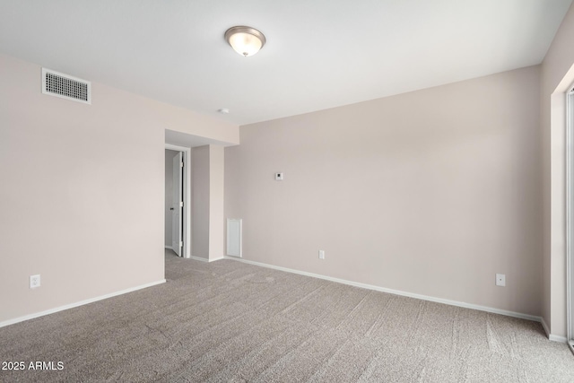 9803 N 40th Dr, Phoenix, AZ 85051 - spare room with light carpet and baseboards