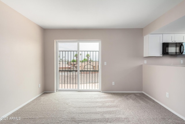 9803 N 40th Dr, Phoenix, AZ 85051 - carpeted spare room featuring baseboards