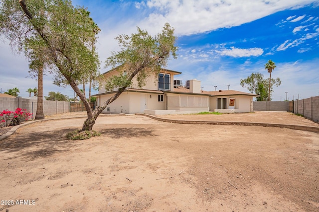 9803 N 40th Dr, Phoenix, AZ 85051 - rear view of property with a fenced backyard