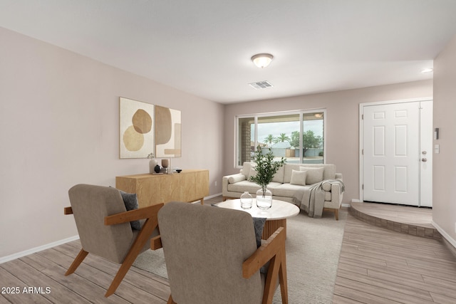 9803 N 40th Dr, Phoenix, AZ 85051 - dining space with light wood-style flooring and baseboards