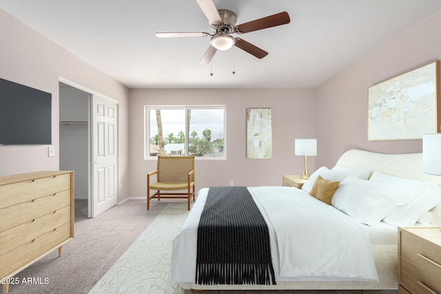 9803 N 40th Dr, Phoenix, AZ 85051 - bedroom featuring light carpet, a closet, a ceiling fan, and baseboards