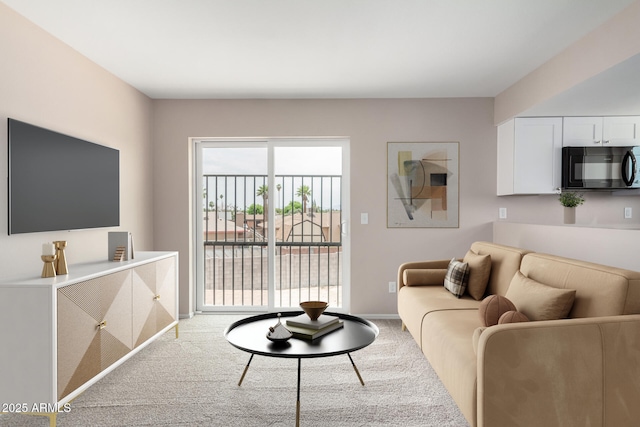 9803 N 40th Dr, Phoenix, AZ 85051 - living area featuring carpet floors and baseboards
