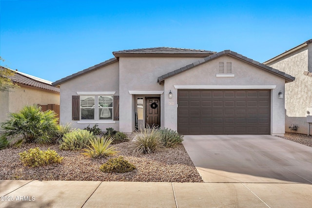 view of front of property featuring a garage