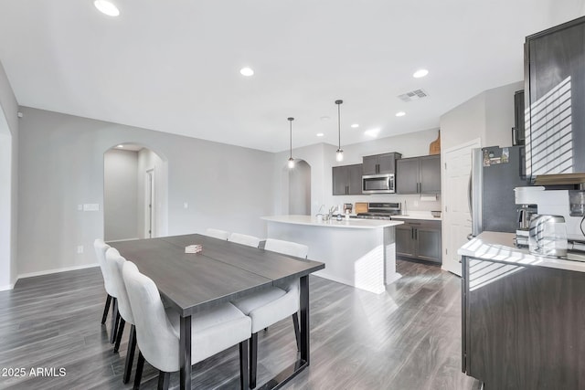 dining room with dark hardwood / wood-style floors