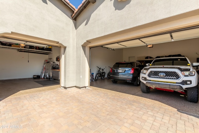 garage featuring a garage door opener