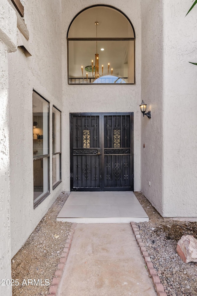 7409 E Pleasant Run, Scottsdale, AZ 85258 - entrance to property featuring stucco siding