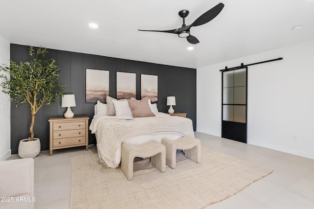 7409 E Pleasant Run, Scottsdale, AZ 85258 - bedroom with a barn door, recessed lighting, and a ceiling fan