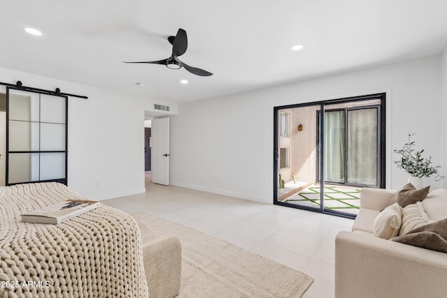 7409 E Pleasant Run, Scottsdale, AZ 85258 - bedroom with access to exterior, recessed lighting, baseboards, light tile patterned flooring, and a barn door