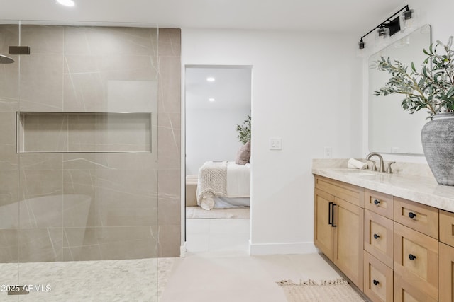 7409 E Pleasant Run, Scottsdale, AZ 85258 - ensuite bathroom with vanity, a walk in shower, recessed lighting, and baseboards