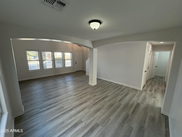 unfurnished living room with light hardwood / wood-style flooring