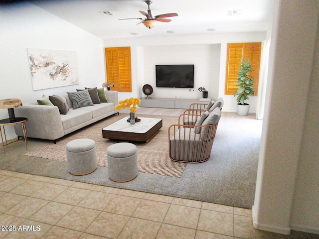 living room with ceiling fan and light tile patterned floors