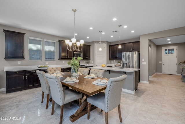 dining room with recessed lighting, visible vents, light tile patterned floors, baseboards, and a notable chandelier
