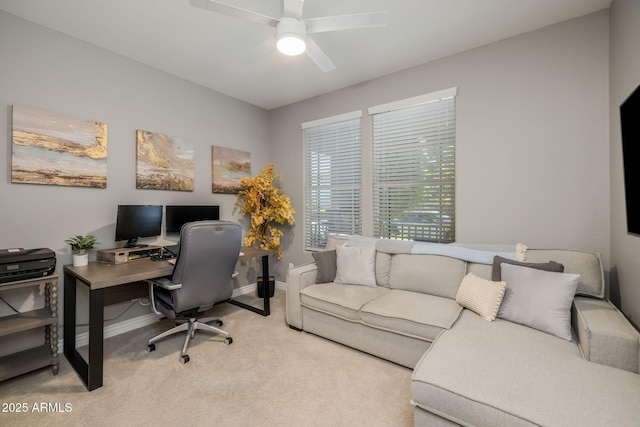 home office with baseboards, carpet, and ceiling fan