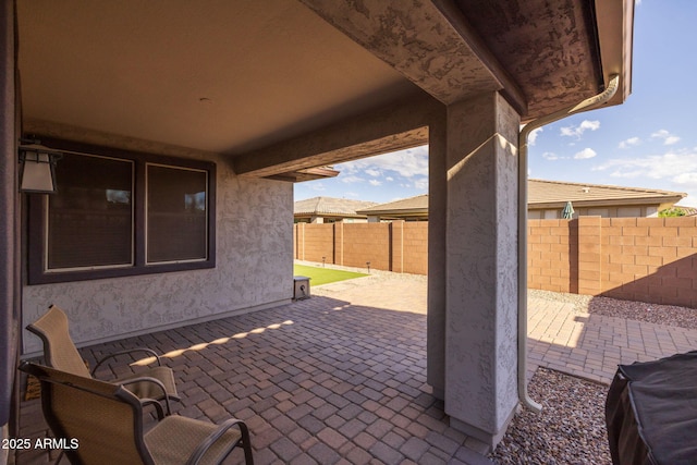 view of patio / terrace featuring grilling area and a fenced backyard