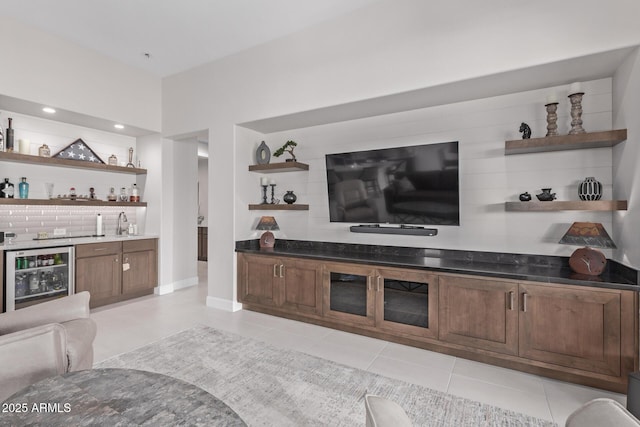 tiled living room with wine cooler and indoor wet bar