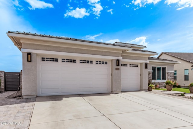 prairie-style house with a garage