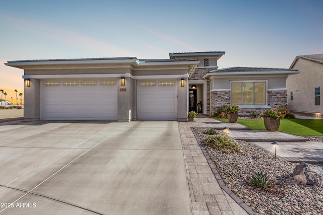 prairie-style home with a garage