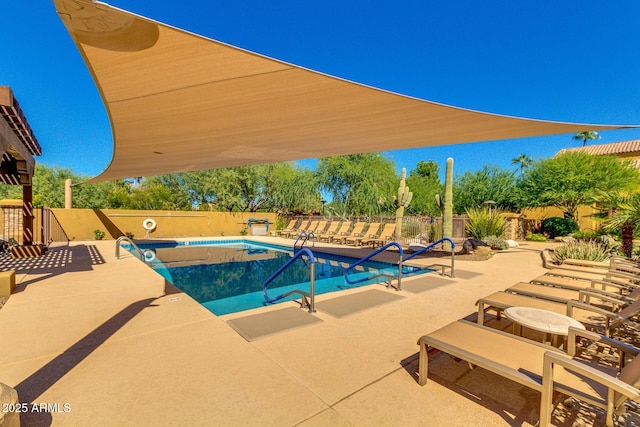 view of pool featuring a patio area