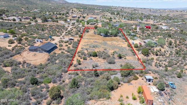 9495 E Marilyn Ln, Dewey, AZ 86327 - overview of rural landscape with property parcel outlined, a desert landscape, and a mountain backdrop
